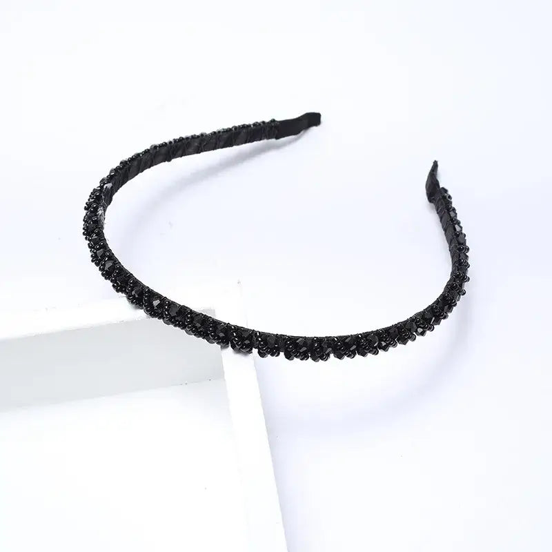 Hárspöng með steinum