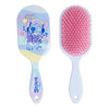 "Hárbursti Stitch hairbrush with colorful design and pink bristles, featuring a cartoon character on the handle."