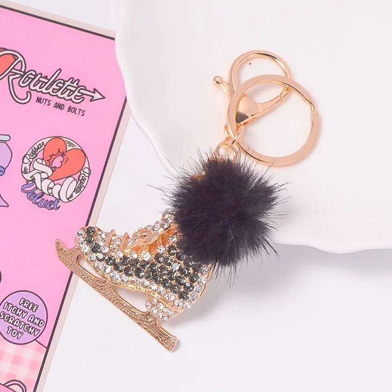 Glitrandi Lyklakippa með Skauta og Pompom