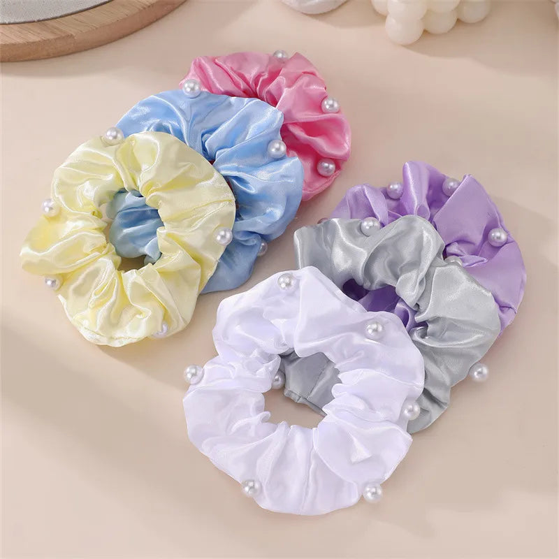 Hárteygjur með perlum